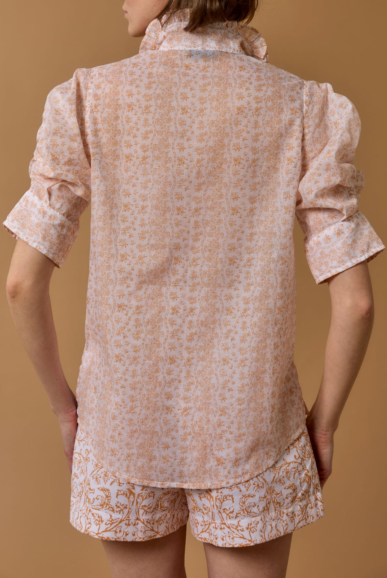 Back view of blouse over shorts, Vita Evora Print Lemon by Thierry Colson