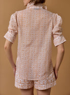Back view of blouse over shorts, Vita Evora Print Lemon by Thierry Colson