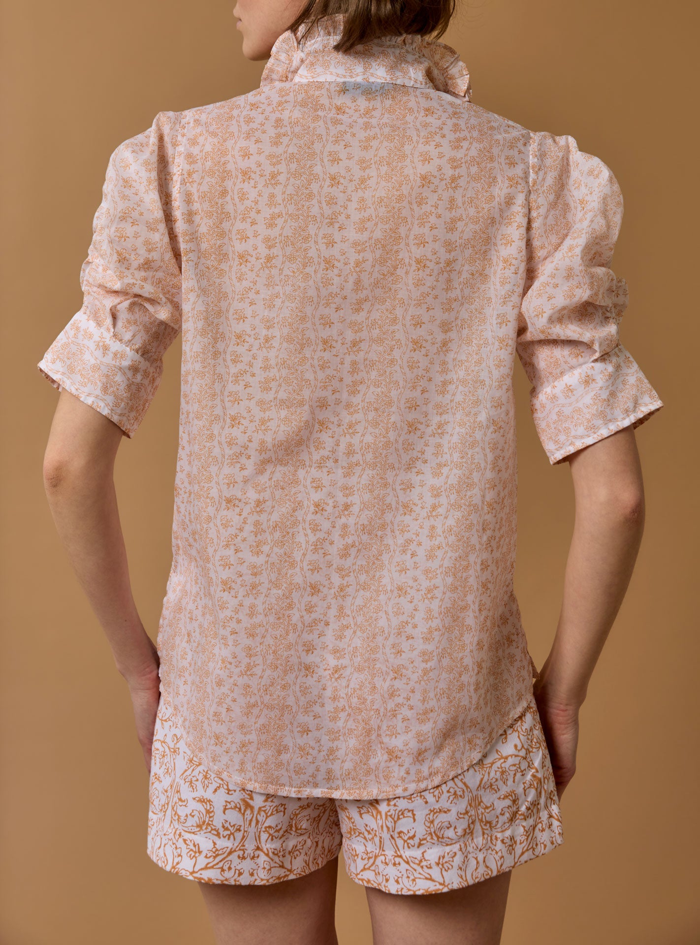 Back view of blouse over shorts, Vita Evora Print Lemon by Thierry Colson