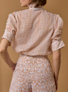 Back view of Vita Evora Print Brandy Blouse by Thierry Colson