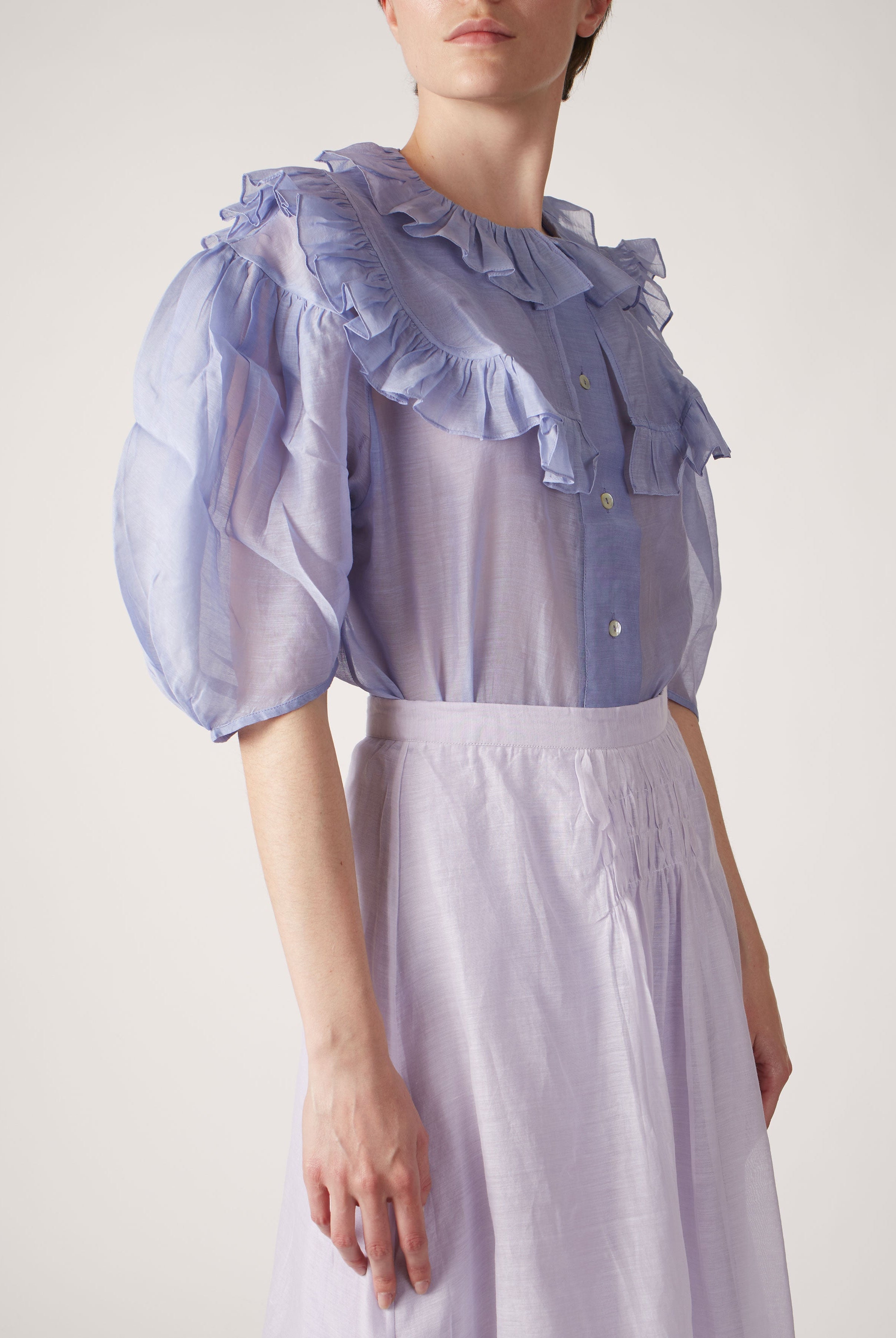 Side view of Vanina Rose Petals Lavander Blouse by Thierry Colson