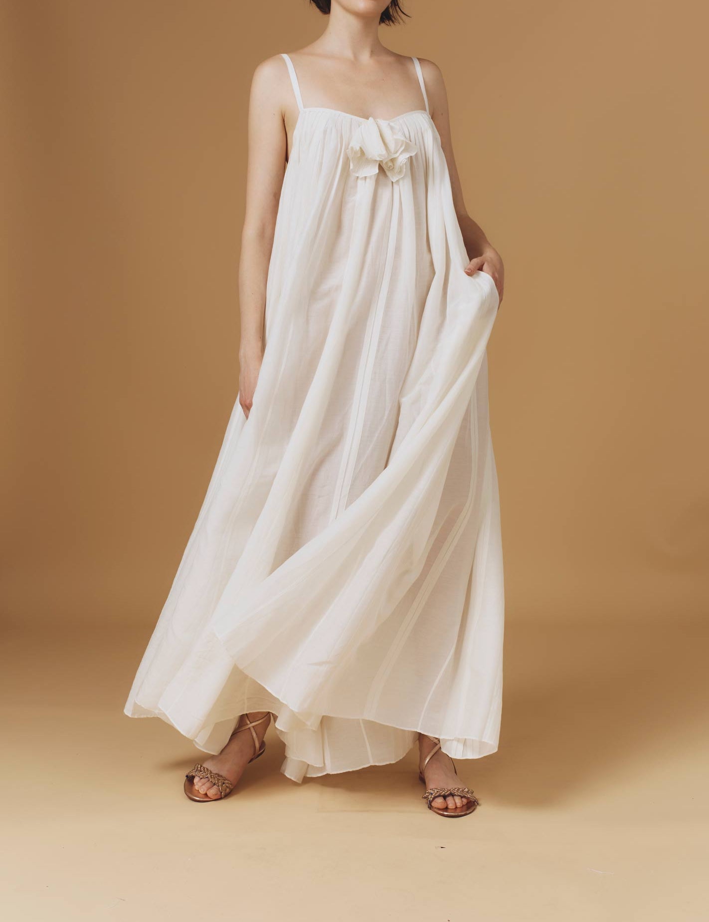 Zenobia Optical Pleats Off White long dress by Thierry Colson