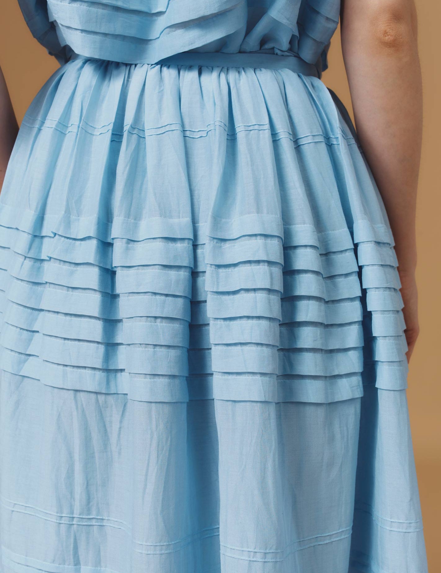 Back detail of Zafar Optical Pleats Heaven Blue Skirt by Thierry Colson
