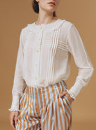 Front view of Zulaika Boutis Off White Blouse by Thierry Colson