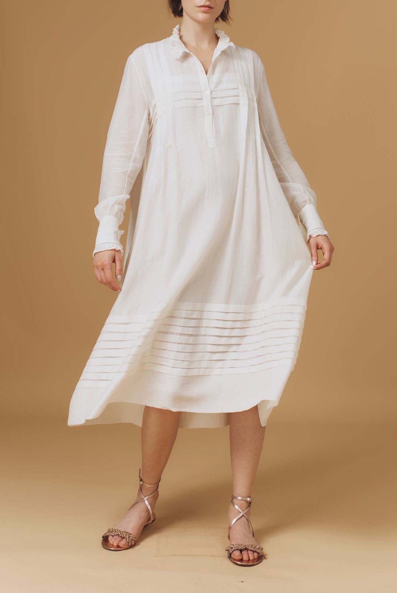 Front view of Zita Optical Pleats Off White dress by Thierry Colson
