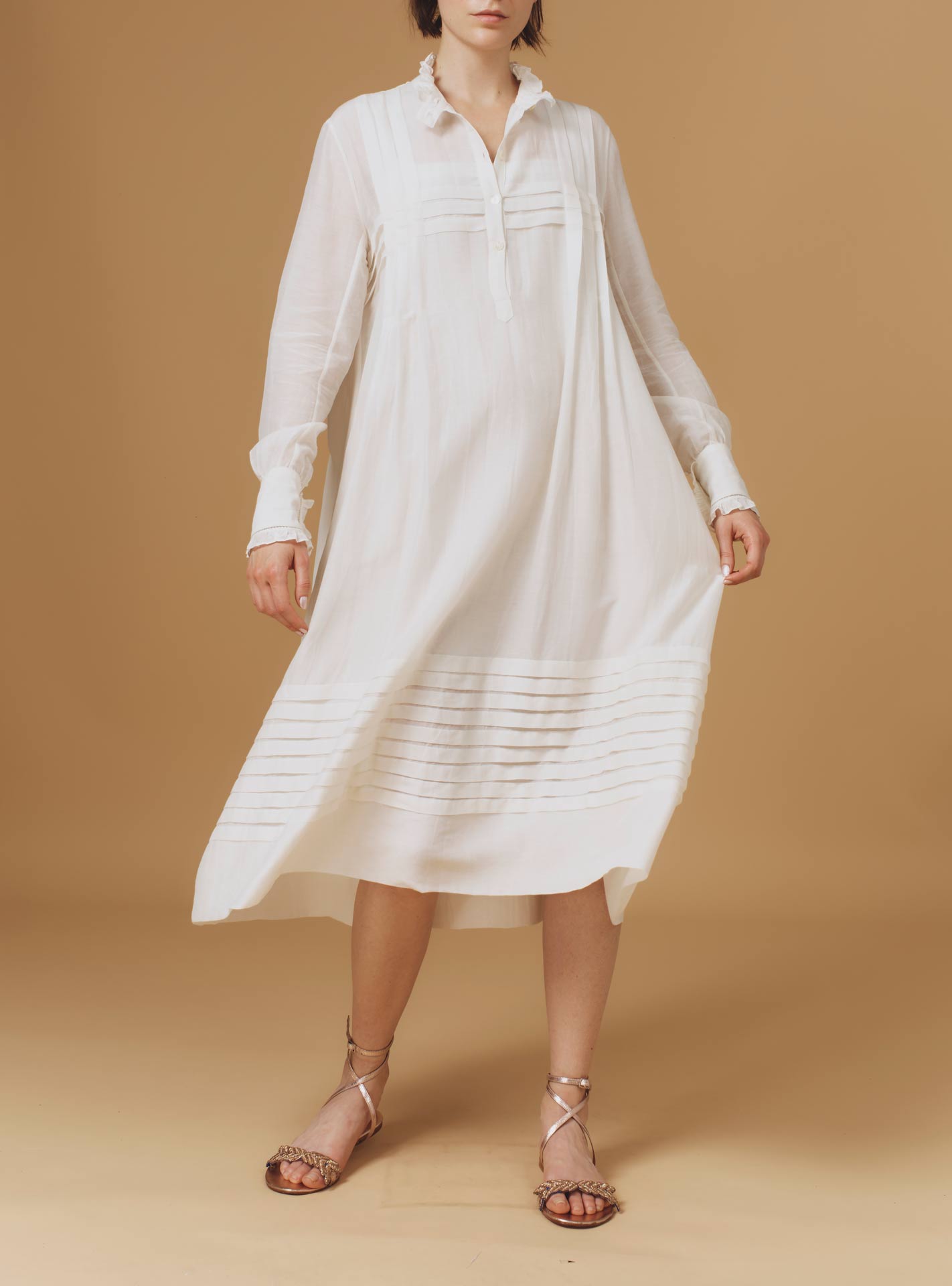 Front view of Zita Optical Pleats Off White dress by Thierry Colson