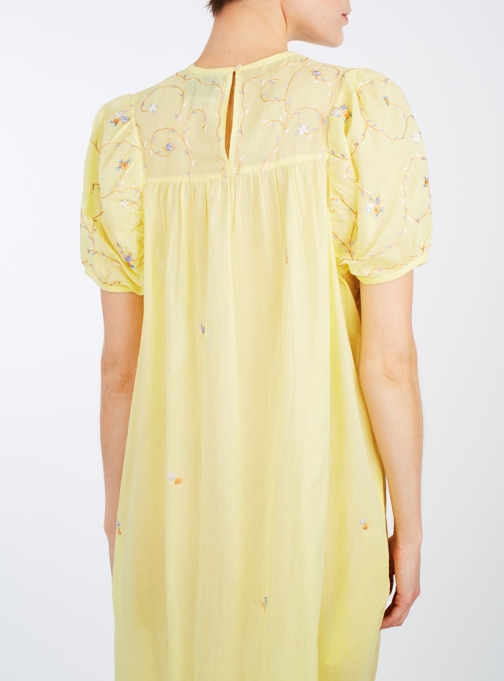 Close up back view of Olympia Sweet Lemon cotton Dress by Thierry Colson