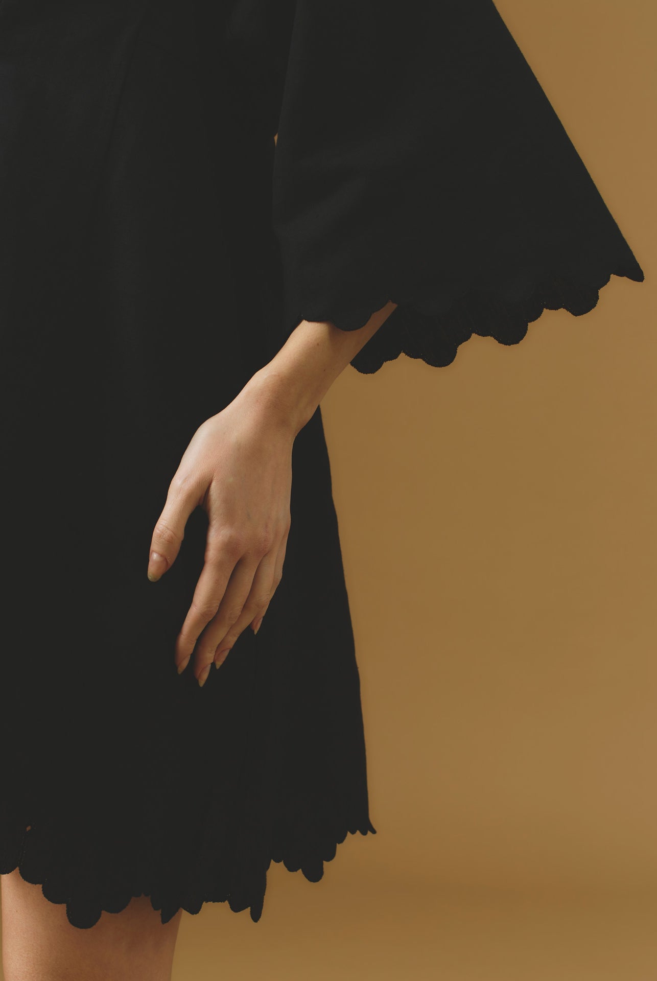 Close up sleeve view Rachel black mini Kaftan by Thierry Colson - Barocco Scallops theme