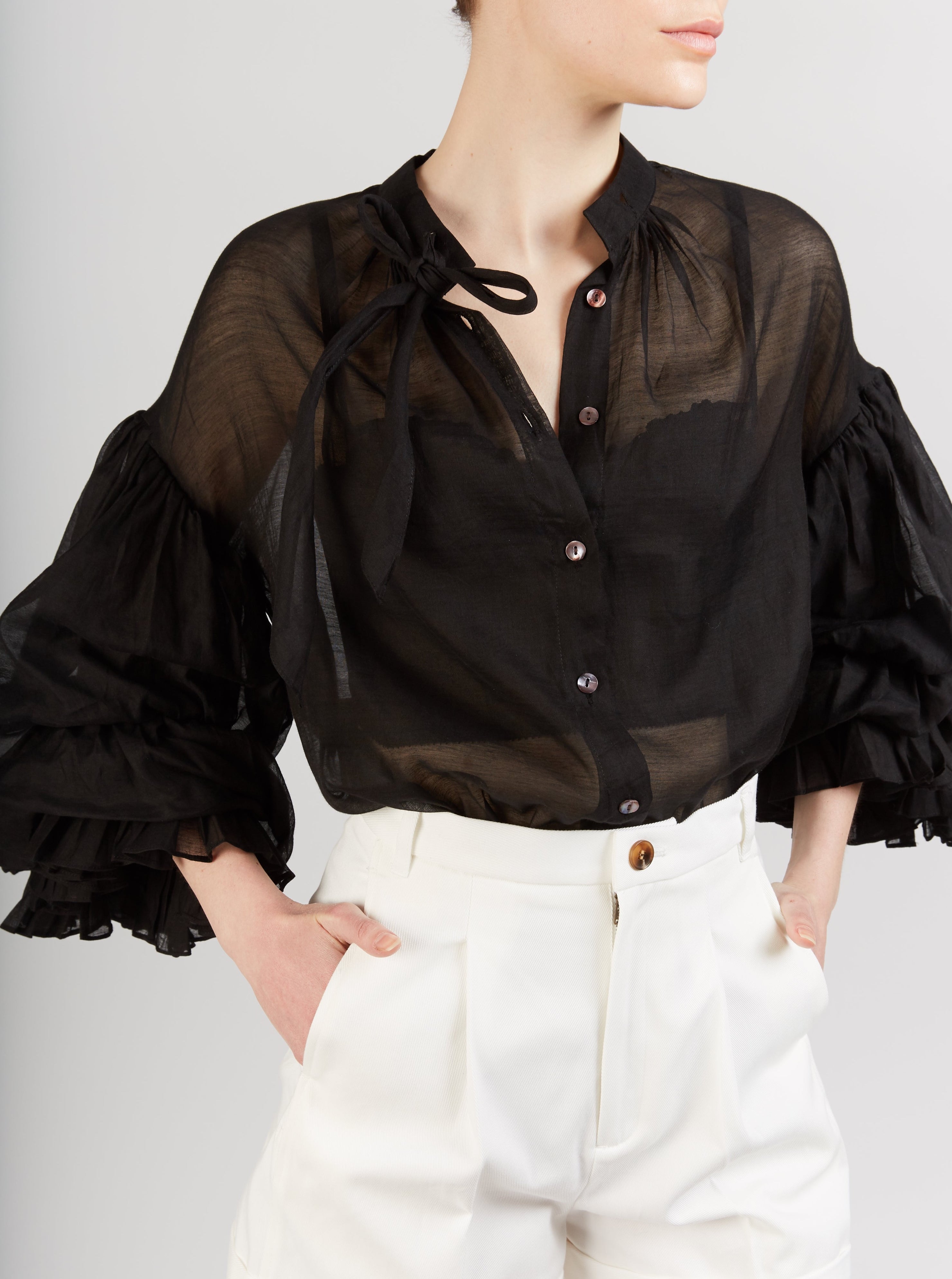 Close up Front view of Rayne black Blouse by Thierry Colson