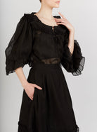 Front view of Roussia Black Blouse by Thierry Colson