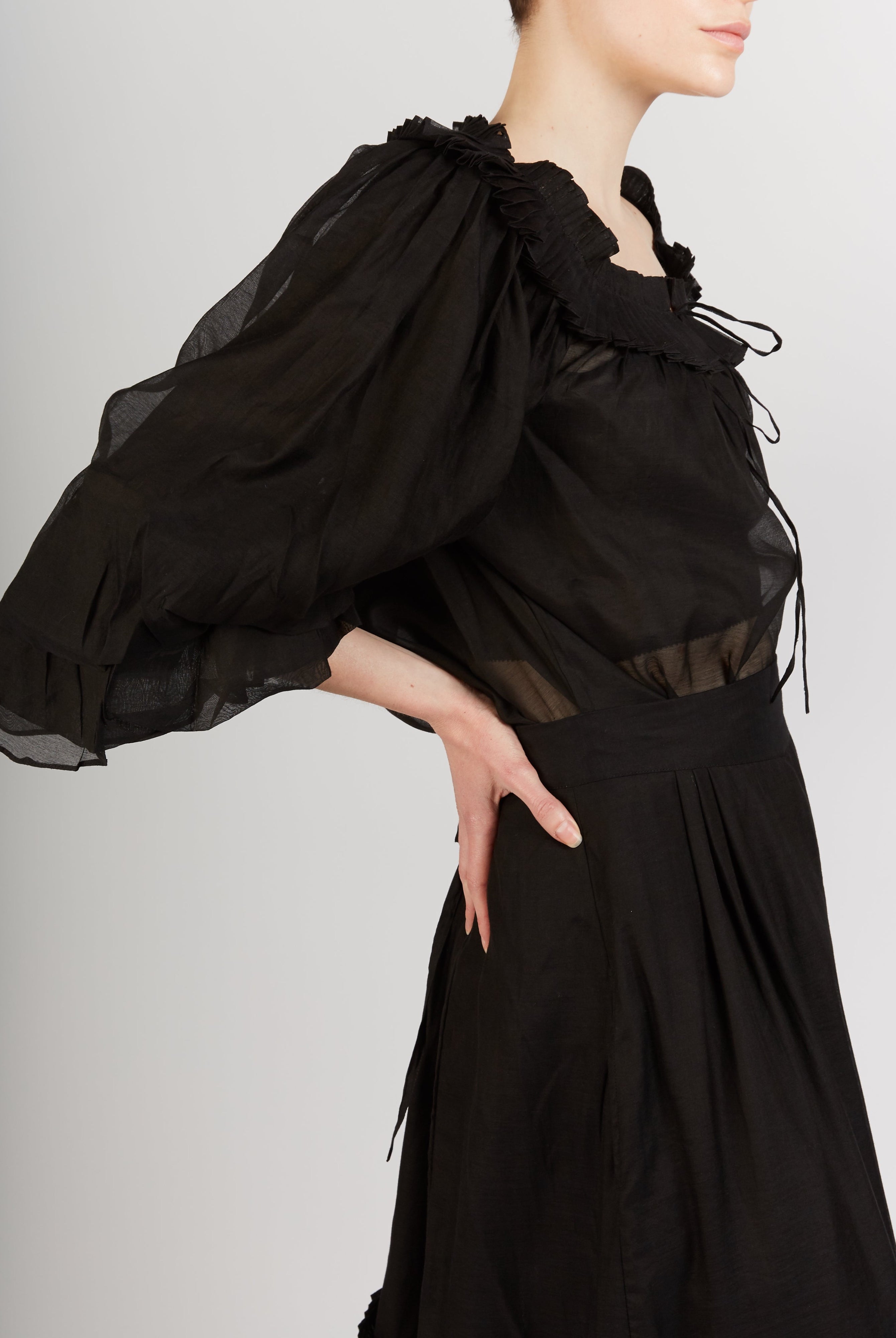 Side view of Roussia Black Blouse by Thierry Colson