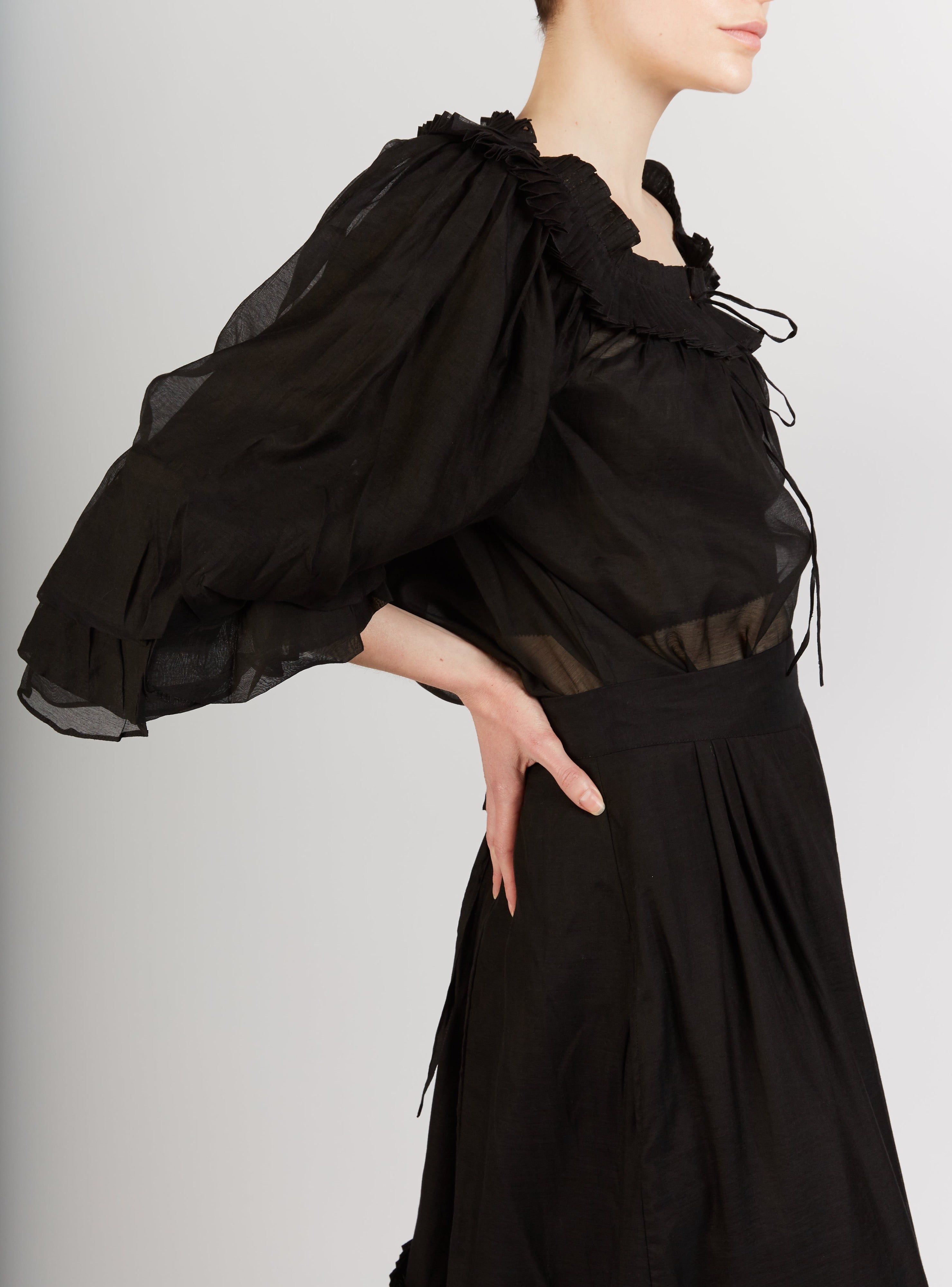 Side view of Roussia Black Blouse by Thierry Colson