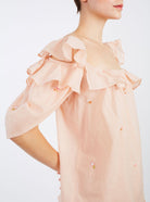 Side view of Venus Boudoir Carmelite Pink Blouse by Thierry Colson