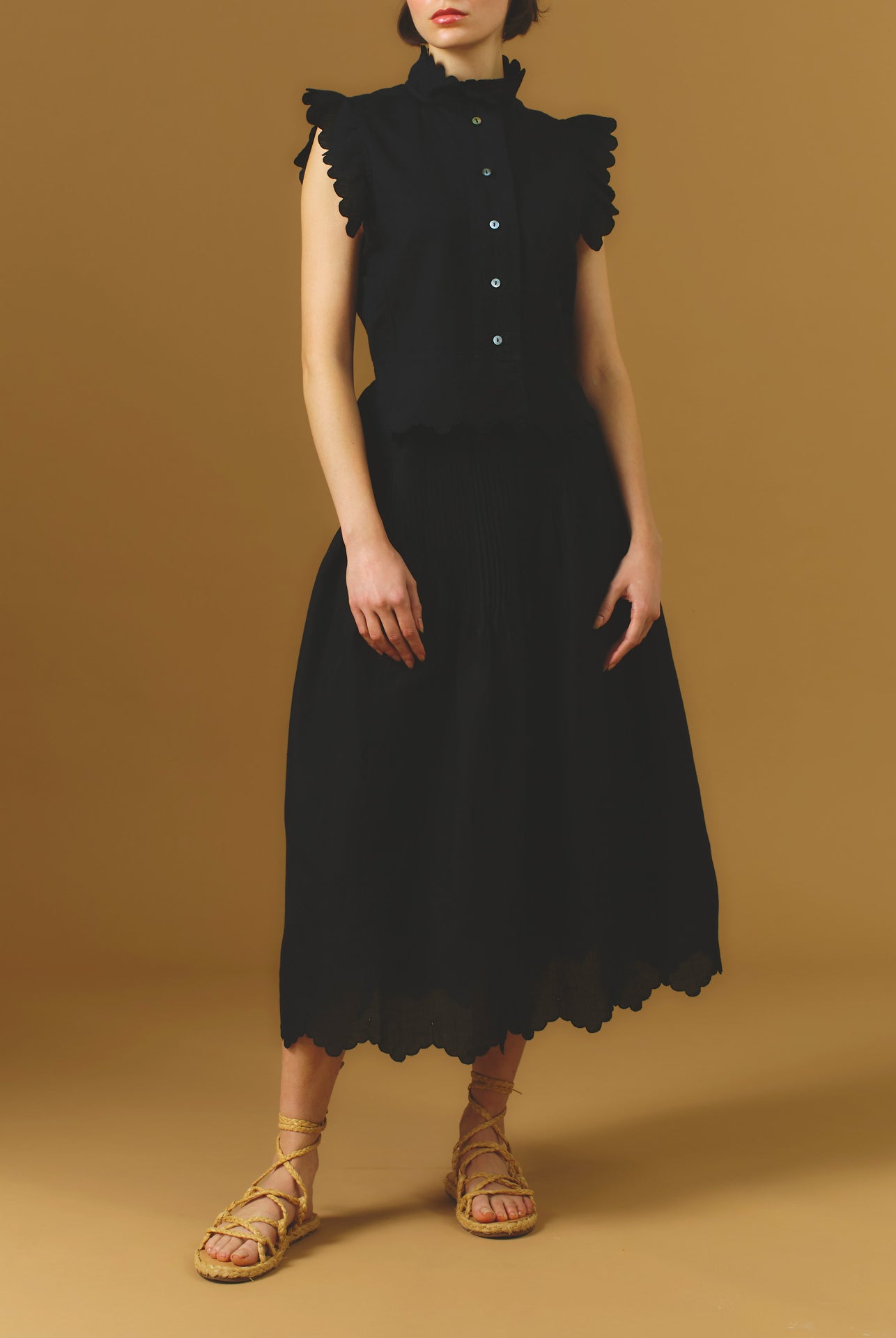 Large font view of Verde Barocco Scallops Black Skirt with Yael vest by Thierry Colson