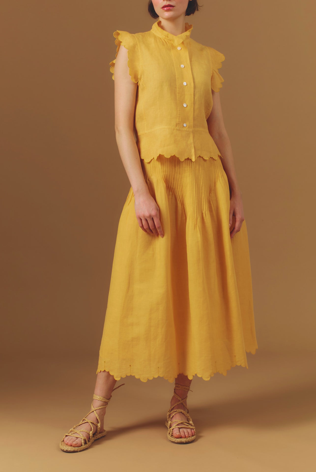 Front view of Verde Barocco Scallops Sunflower Skirt with Yael Vest by Thierry Colson