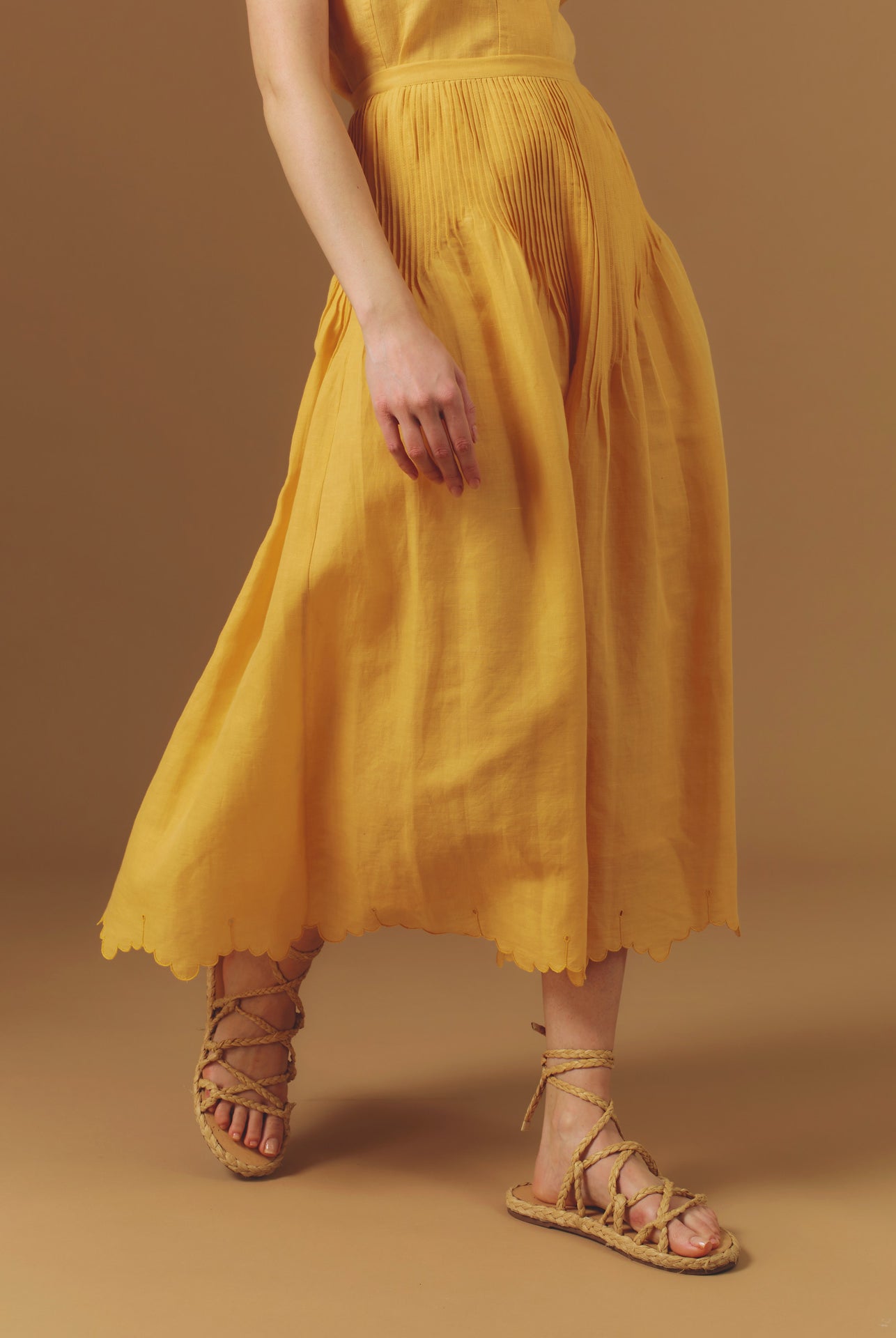 Side view of Verde Barocco Scallops Sunflower Skirt by Thierry Colson