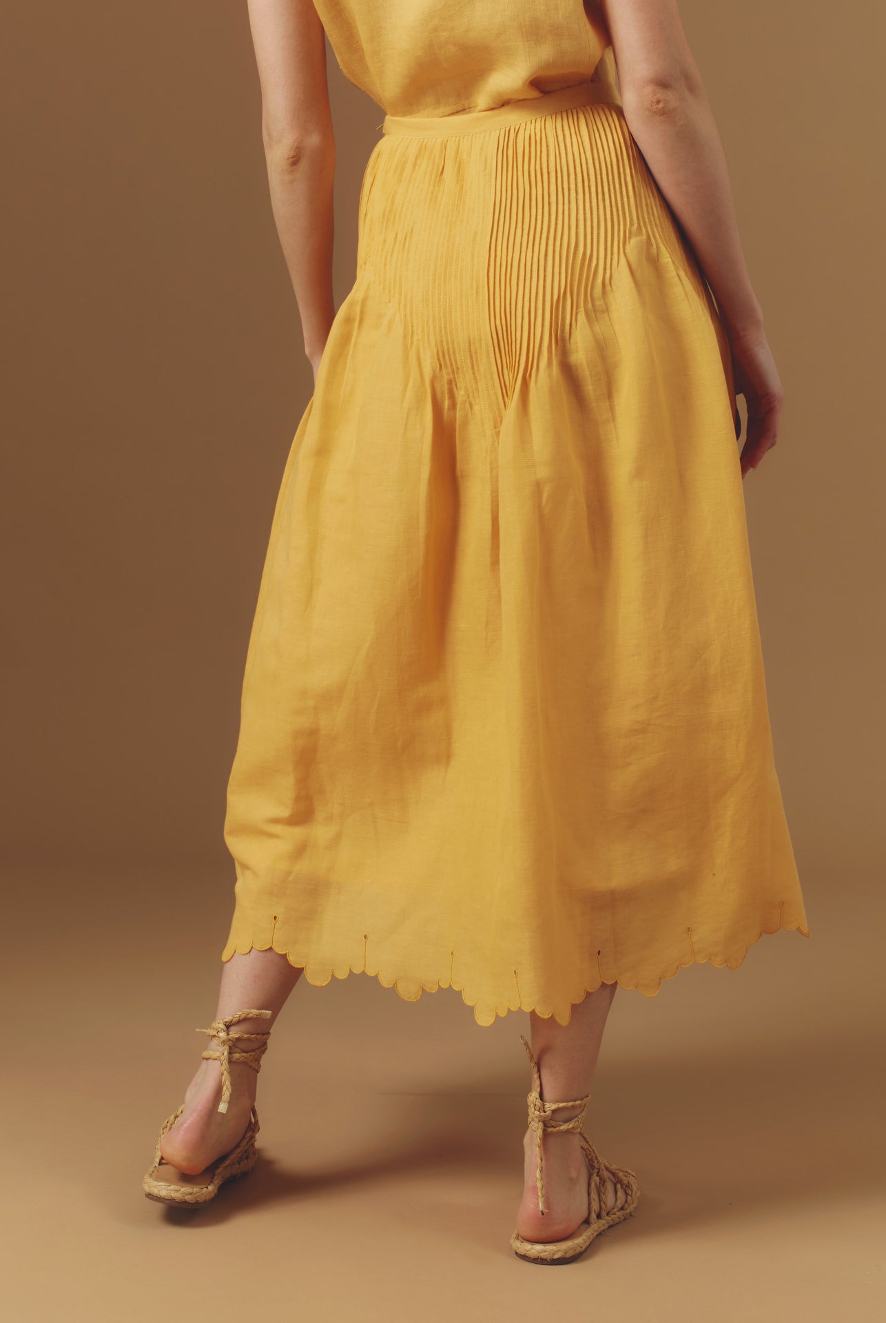 Back view of Verde Barocco Scallops Sunflower Skirt by Thierry Colson