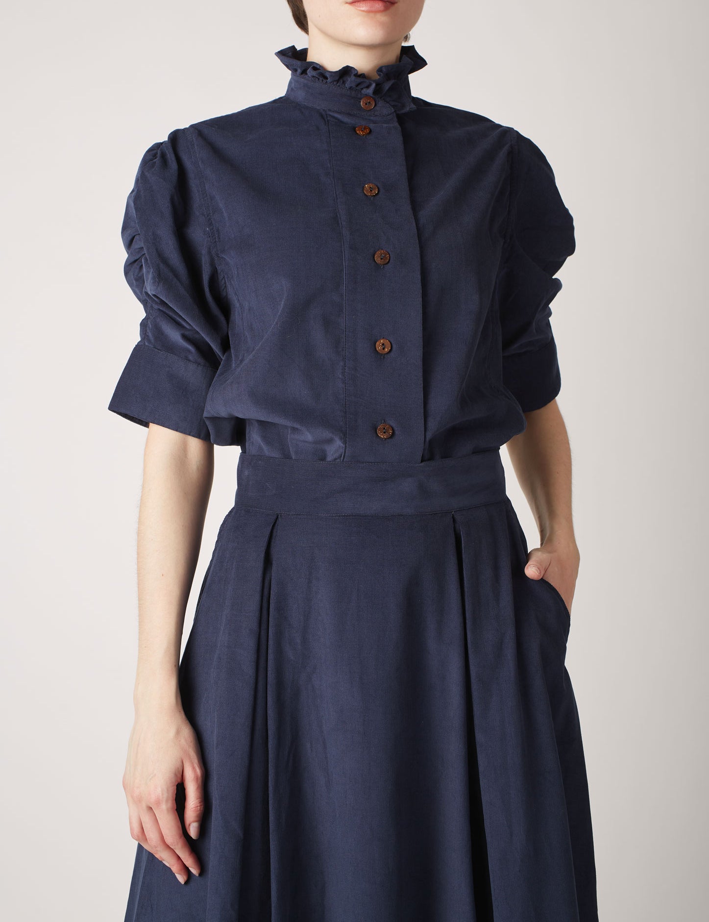 Front view of Vita Prussian Blue Corduroy Shirt  with Wynona Skirt by Thierry Colson