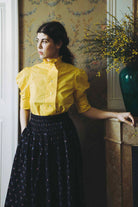 Verde Skirt with Vita blouse a lookbook image from the Pre Spring 2024 collection by Thierry Colson, photographed in Provende by Jamie Beck