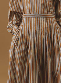 Close-up of Zazou copper striped Cotton Skirt by Thierry Colson