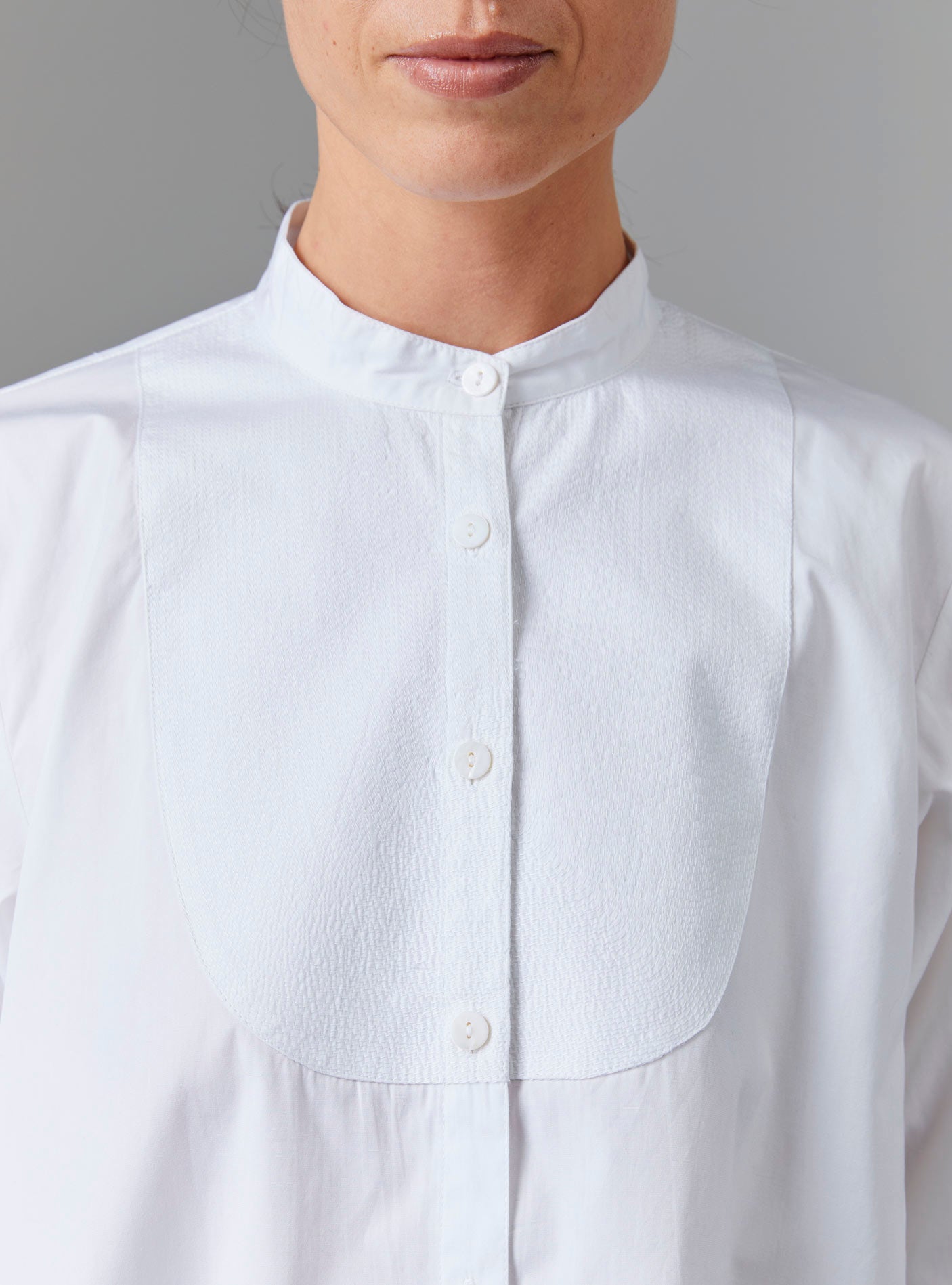 Close up of Ali Shirt - Off White Poplin Topstitching by Thierry Colson