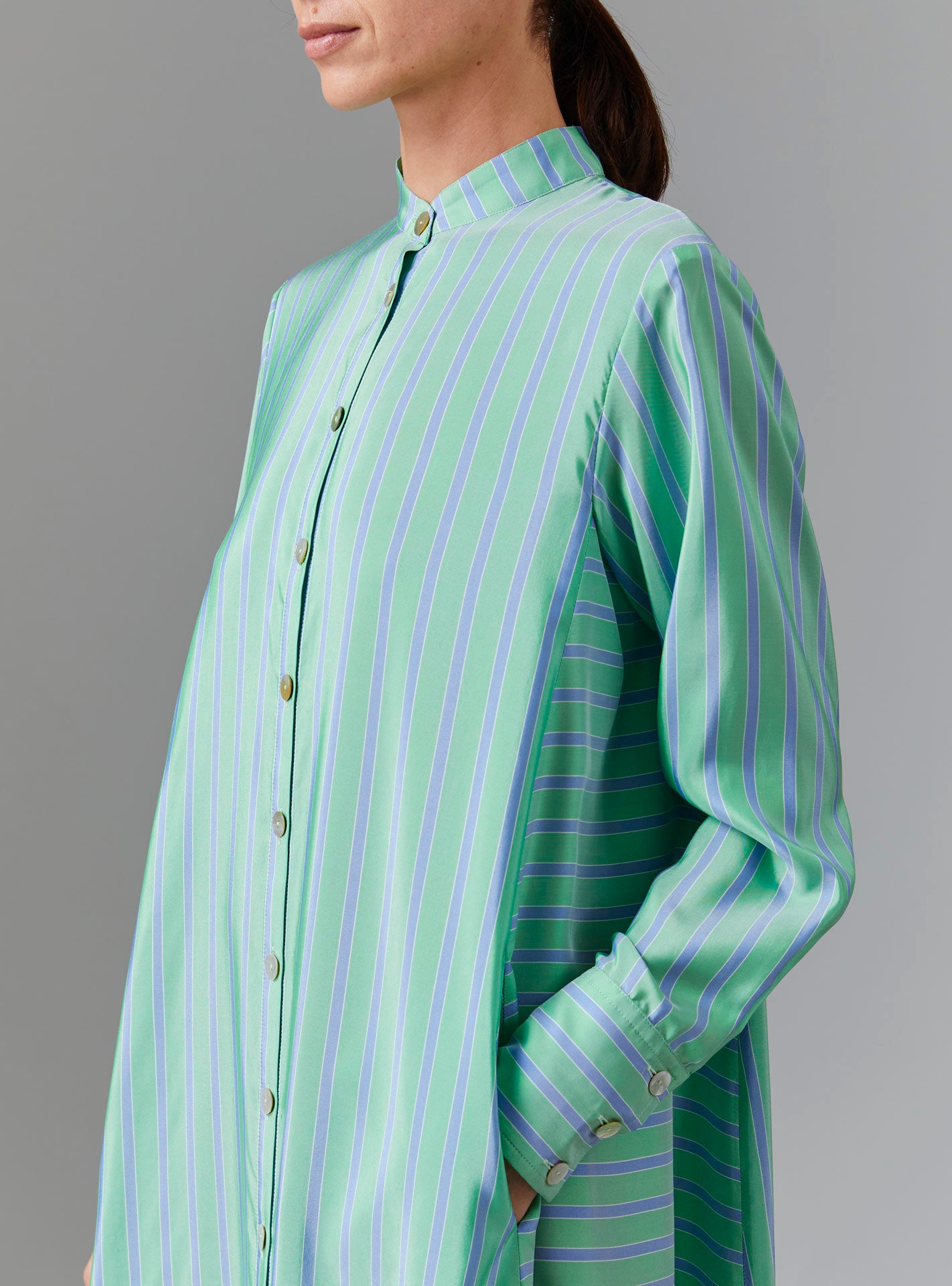 Close up Front view of Alla Dress - Silk Road Stripes - Green / Blue by Thierry Colson