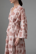 Close up of Almudena Dress - Powder Pink/Copper Toile de Jouy by Thierry Colson