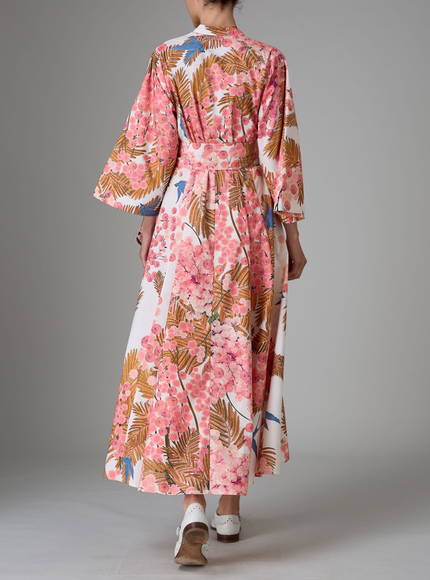 Back view of Almudena kaftan kimono dress in Garden of Eden print by Thierry Colson for Pre Spring 25