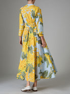 Back view of Almudena kaftan kimono dress in yellow and storm blue mimosa-inspired Garden of Eden print. Thierry Colson PS25