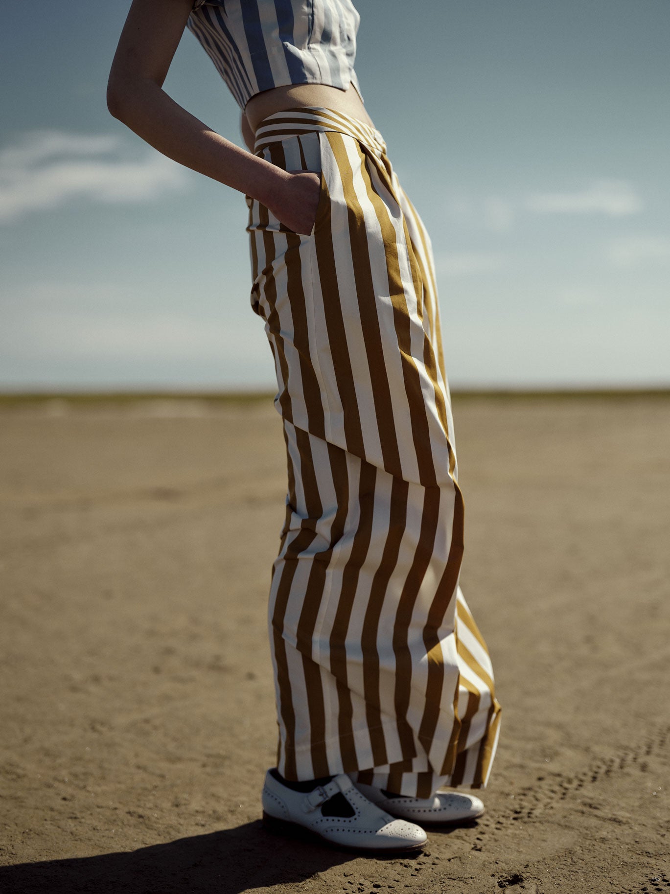 Close-up of retro-style cotton trousers paired with Bianca vest in Storm Blue by Thierry Colson