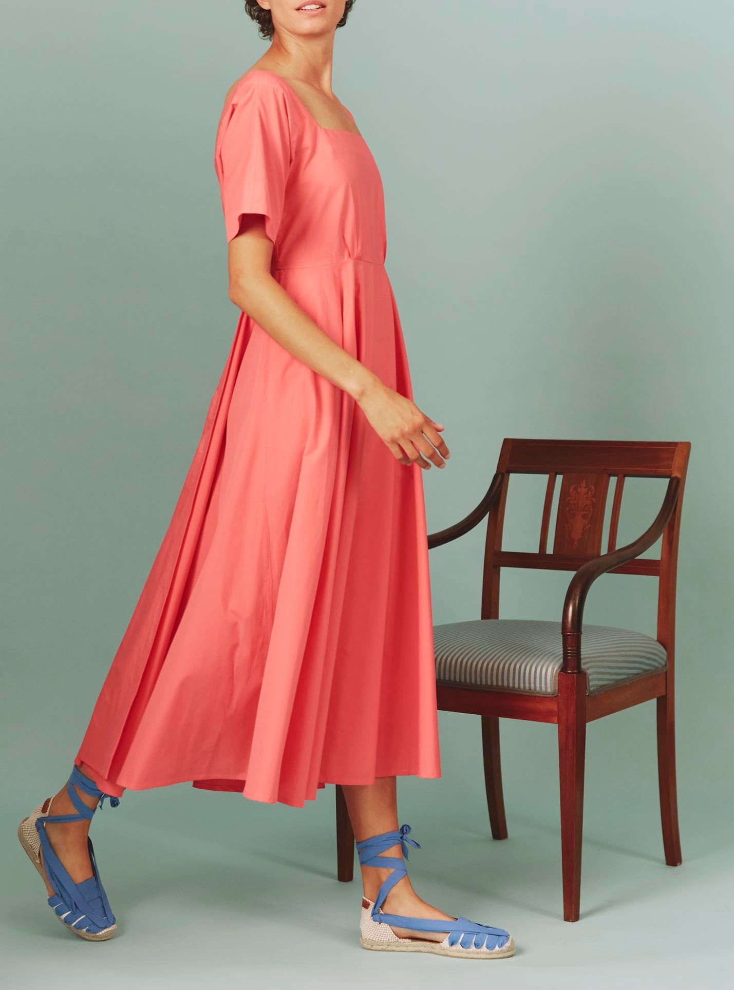 Side view of Allegria Dress: Matisse Plain Poplin in Watermelon by Thierry Colson