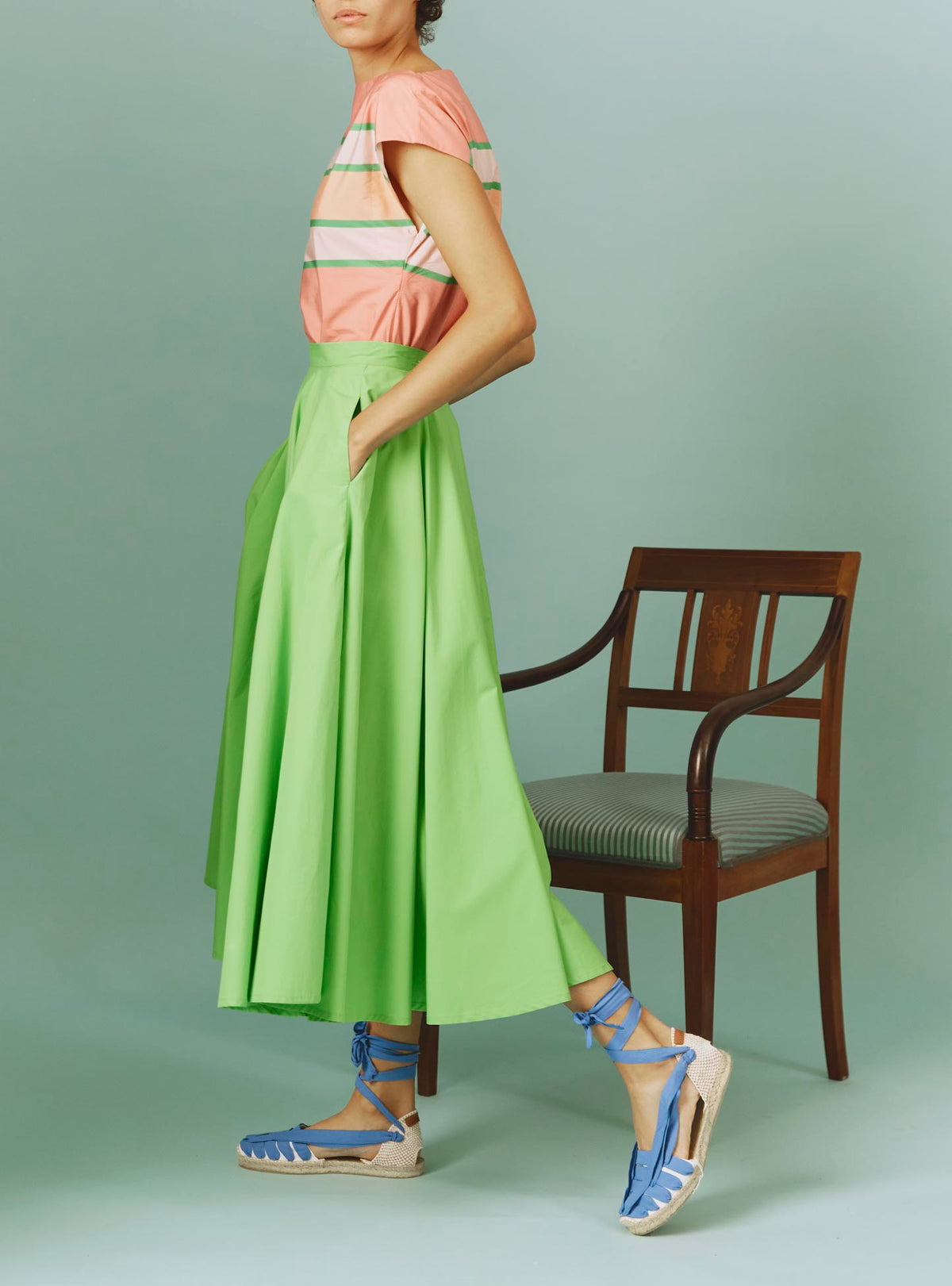 Side view of Audrey Skirt: Matisse Plain Poplin in Green by Thierry Colson