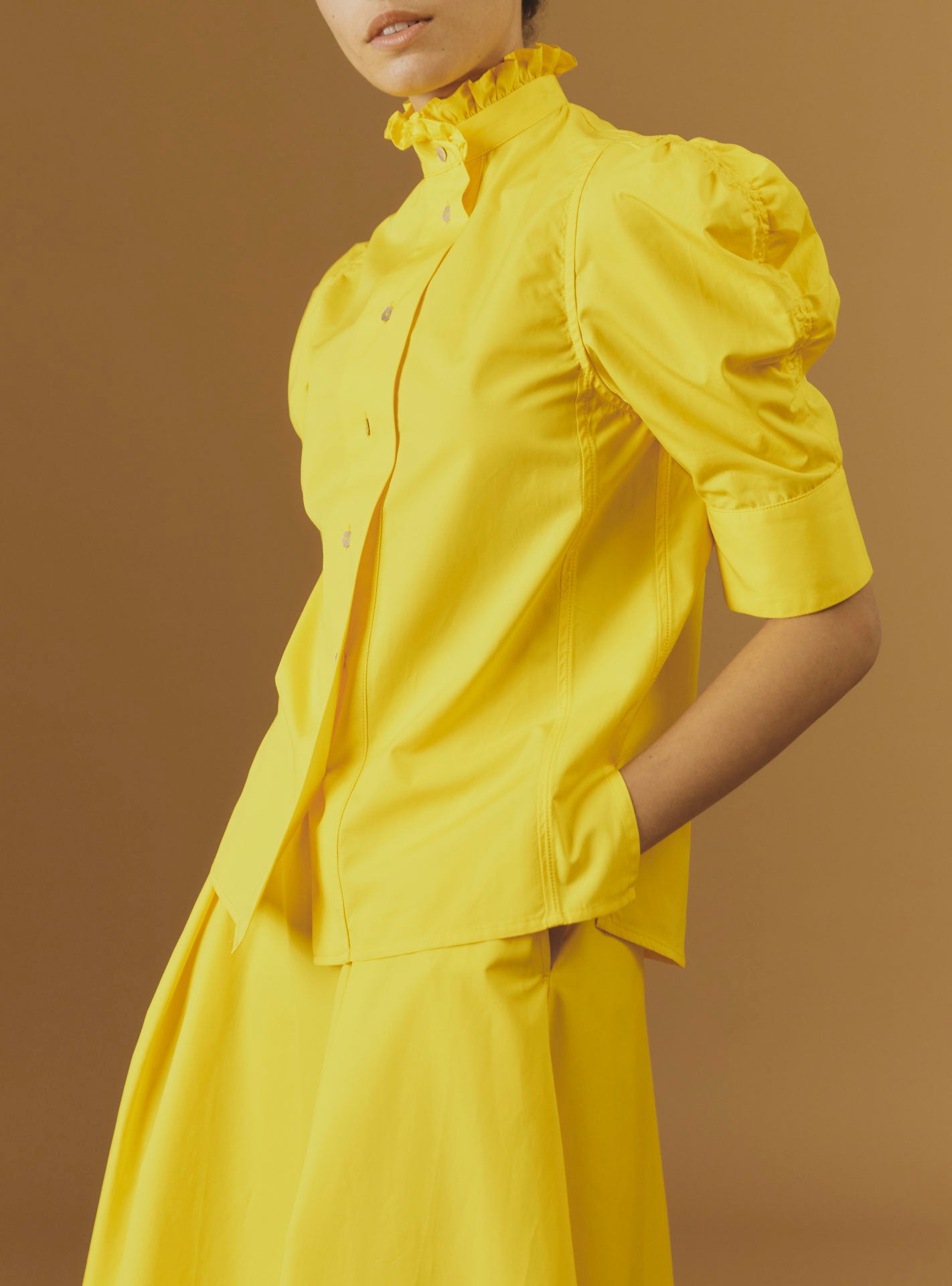Front view of Vita yellow blouse plain poplin with Wynona Yellow skirt  by Thierry Colson