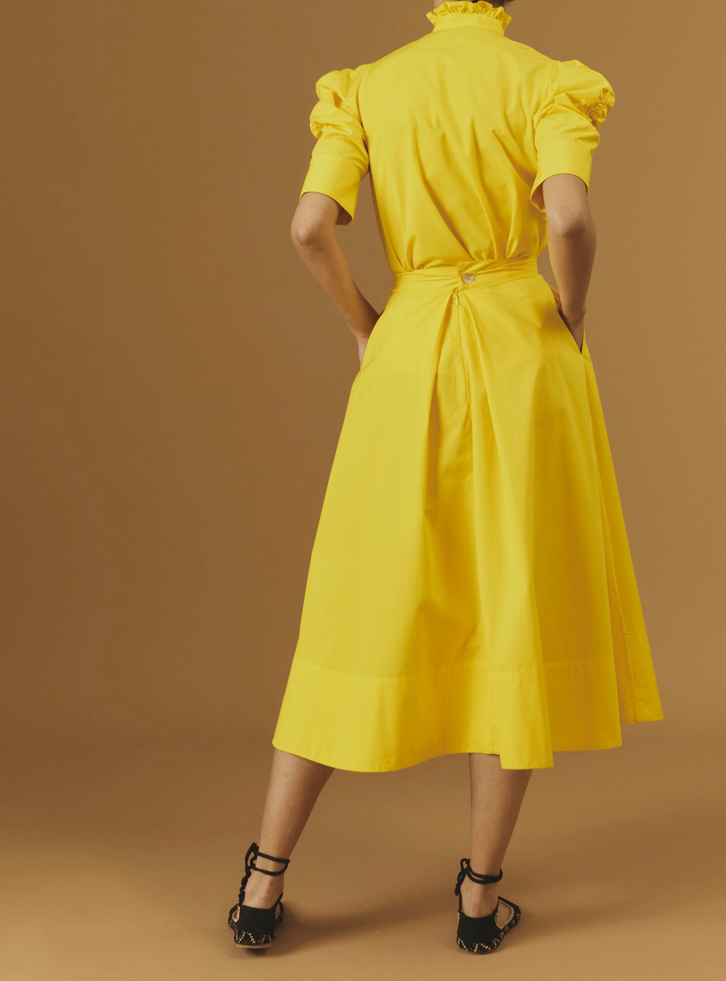 Large back view of Wynona yellow cotton skirt by Thierry Colson