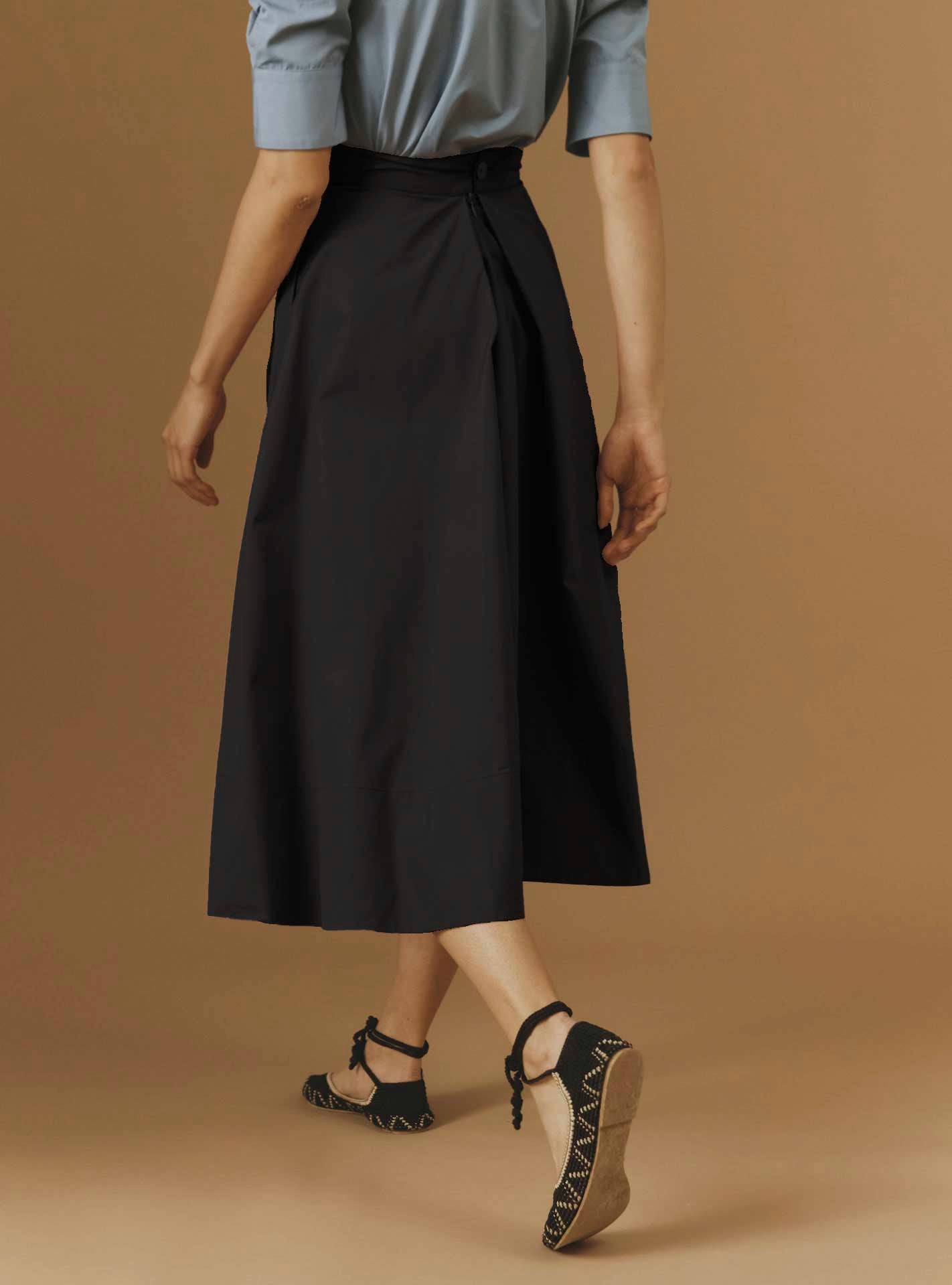 Back view of Wynona Black cotton skirt with pockets by Thierry Colson