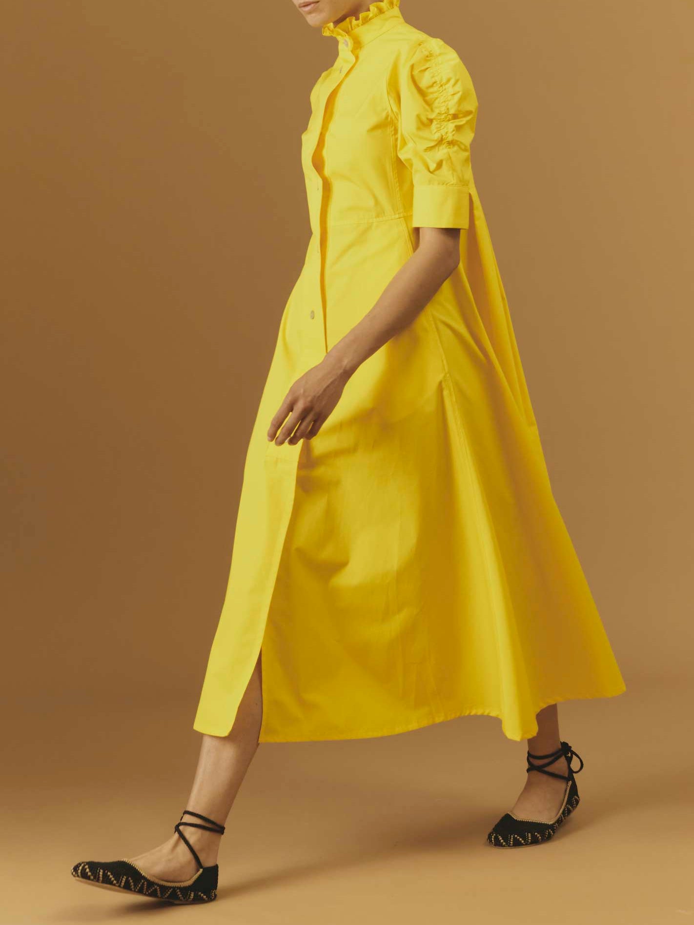 Side view of Venetia luxury cotton Yellow dress by Thierry Colson