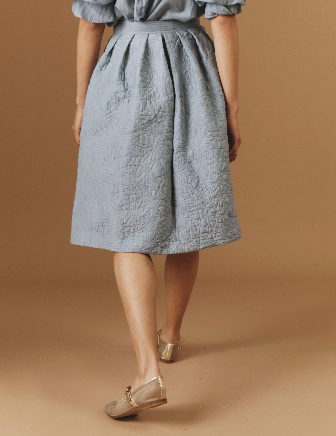 Back view of Riviera Blue/Grey Skirt by Thierry Colson - Boutis Theme