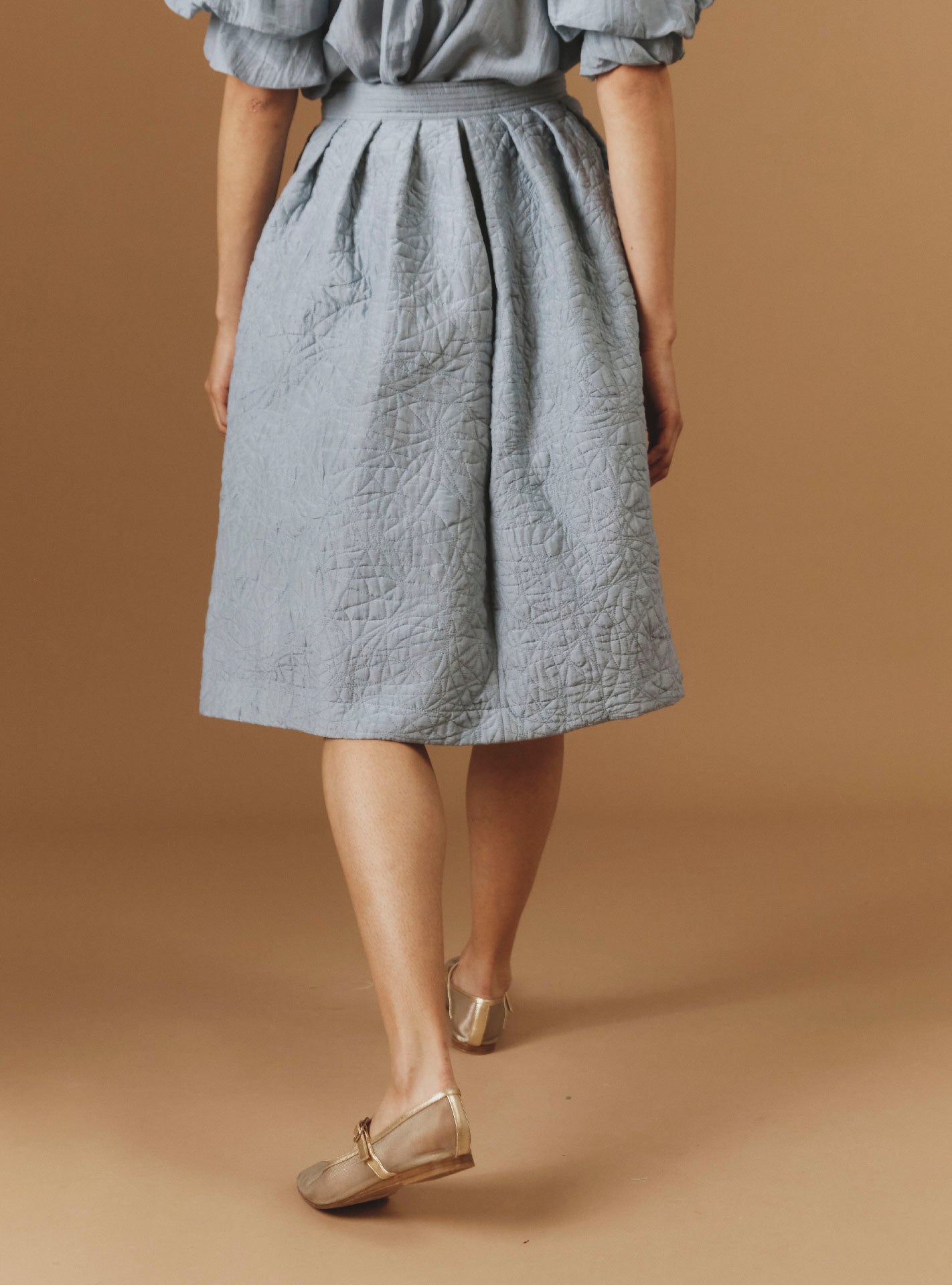 Back view of Riviera Blue/Grey Skirt by Thierry Colson - Boutis Theme