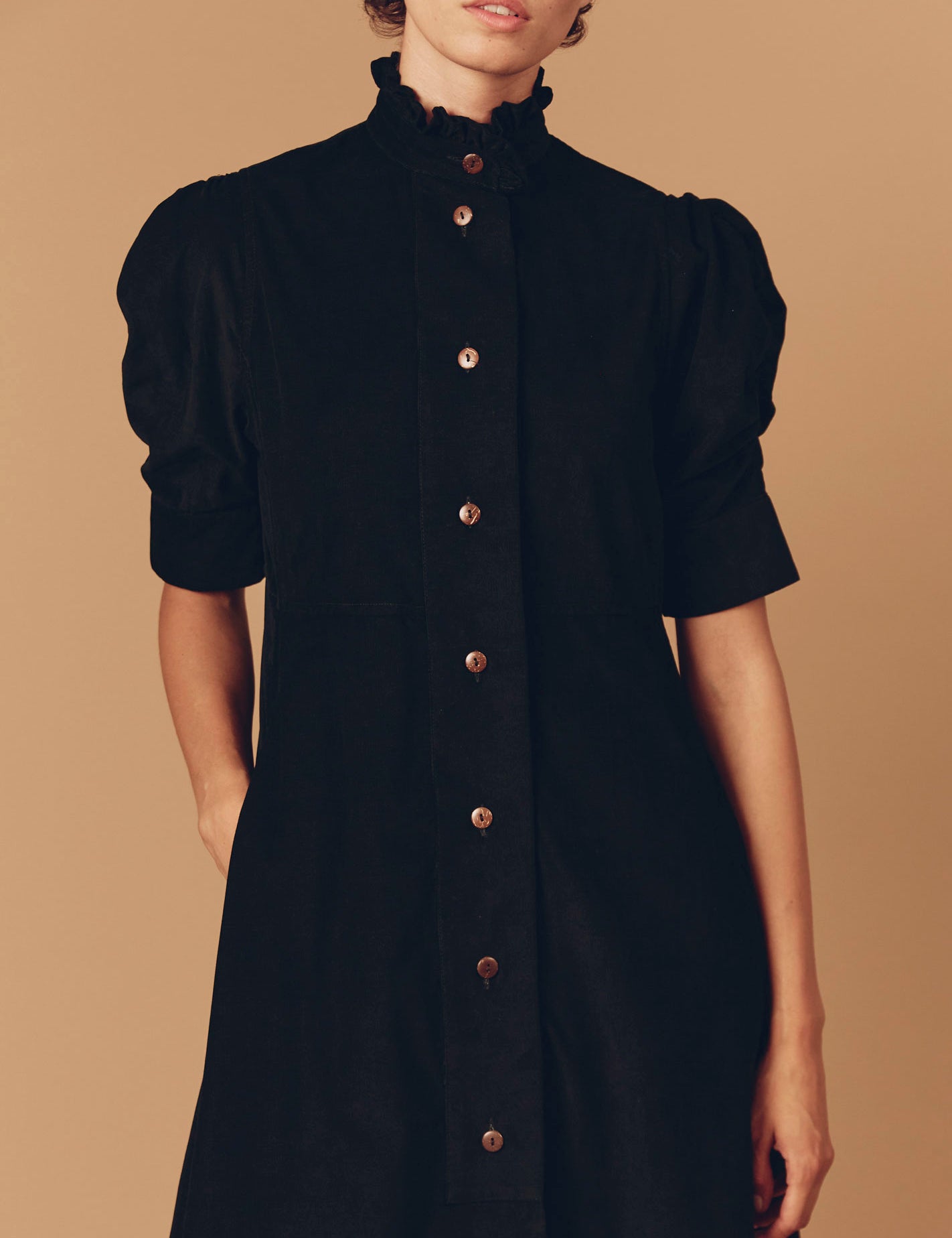 Close up Front view of Venetia Black Plain Corduroy Dress by Thierry Colson