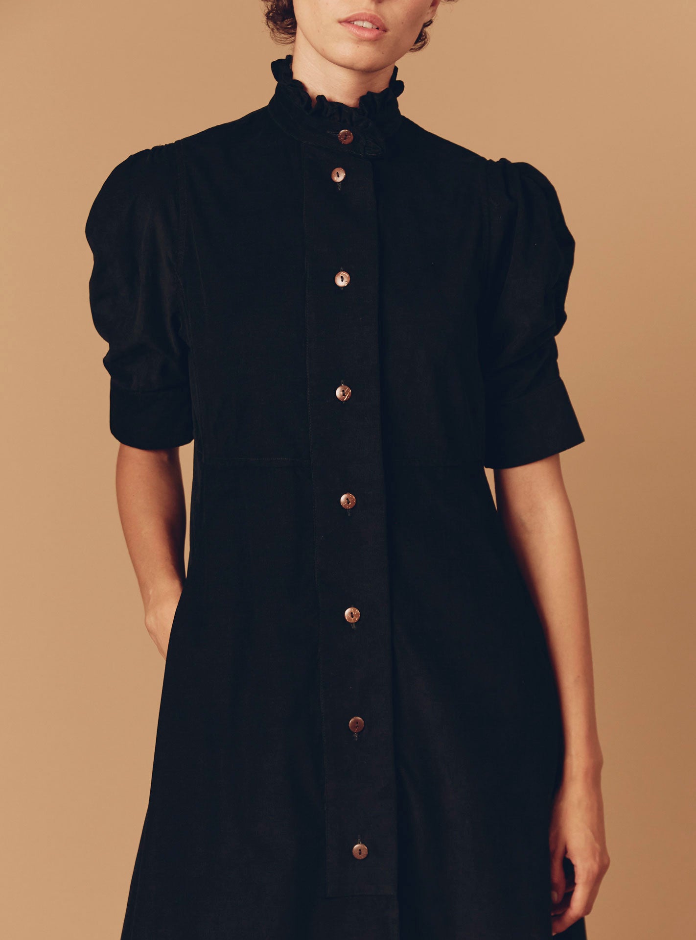 Close up Front view of Venetia Black Plain Corduroy Dress by Thierry Colson
