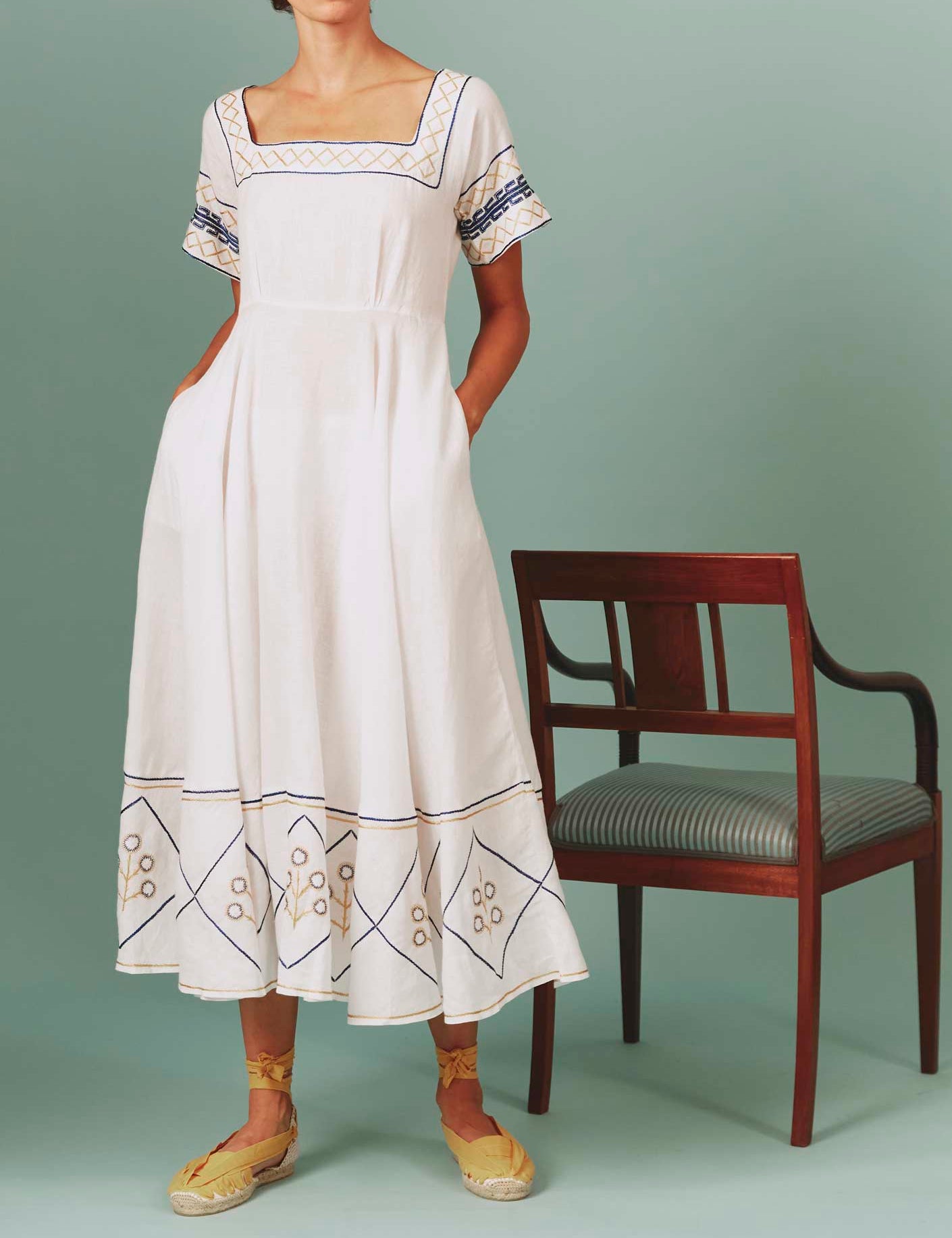 Front view of Allegria Dress: Archaic Embroidery in White by Thierry Colson