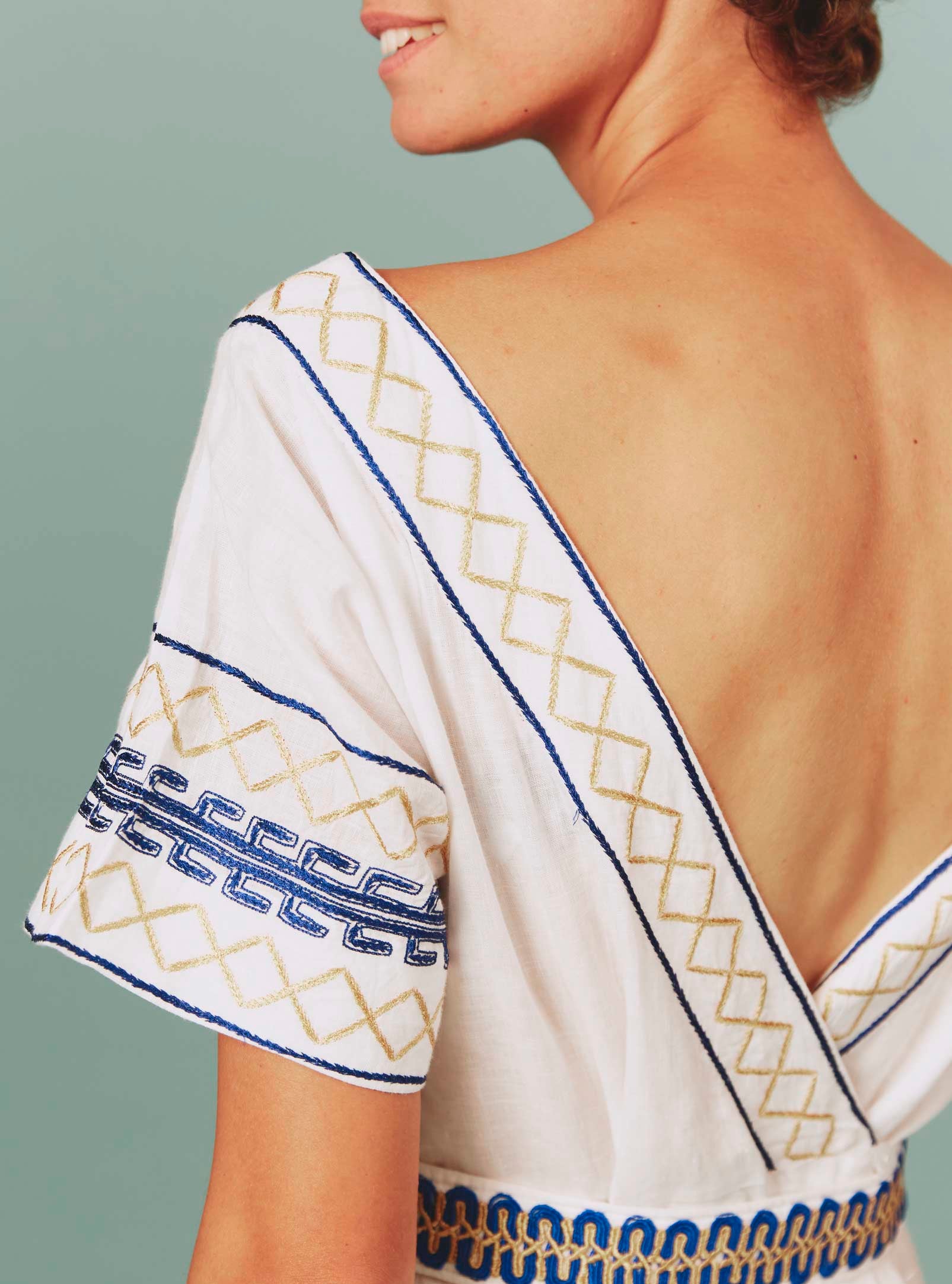 Back détail of Allegria Dress: Archaic Embroidery in White by Thierry Colson