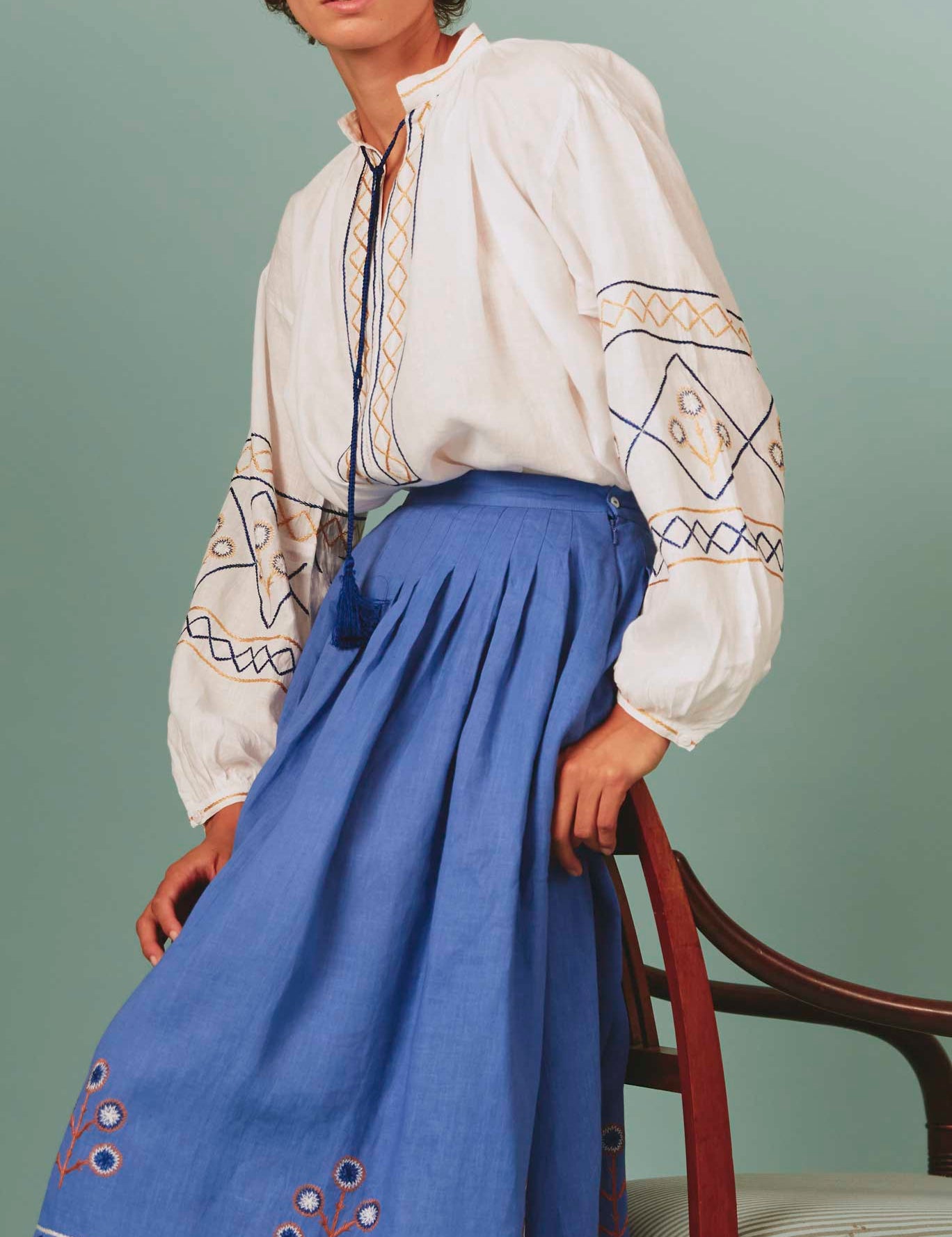 Side view of Lavender Zazou Skirt with White Guise Blouse: Archaic Embroidery by Thierry Colson