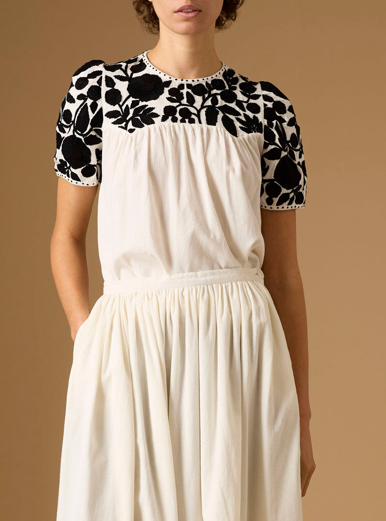 Close up - Front view of Olympia Embroidered Corduroy Cream/Black Top with skirt by Thierry Colson 
