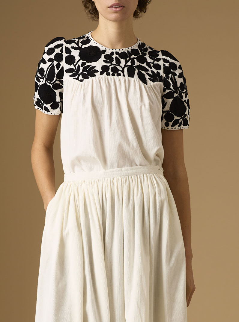 Close up - Front view of Olympia Embroidered Corduroy Cream/Black Top with skirt by Thierry Colson 