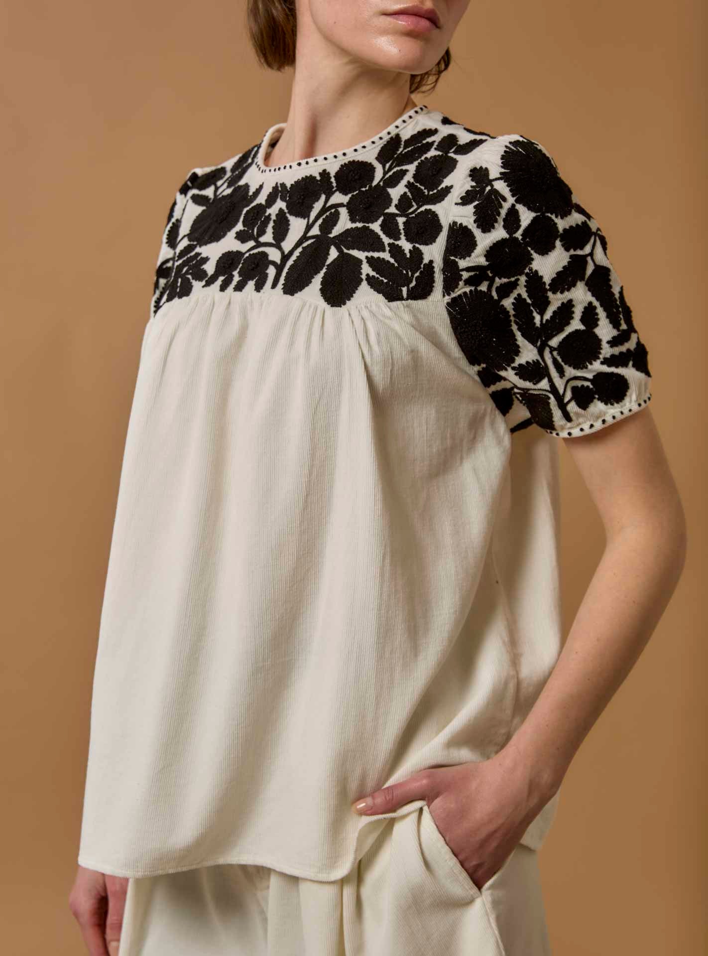 Detail - Side view of Olympia Embroidered Corduroy Cream/Black Top with Kenya Short by Thierry Colson 