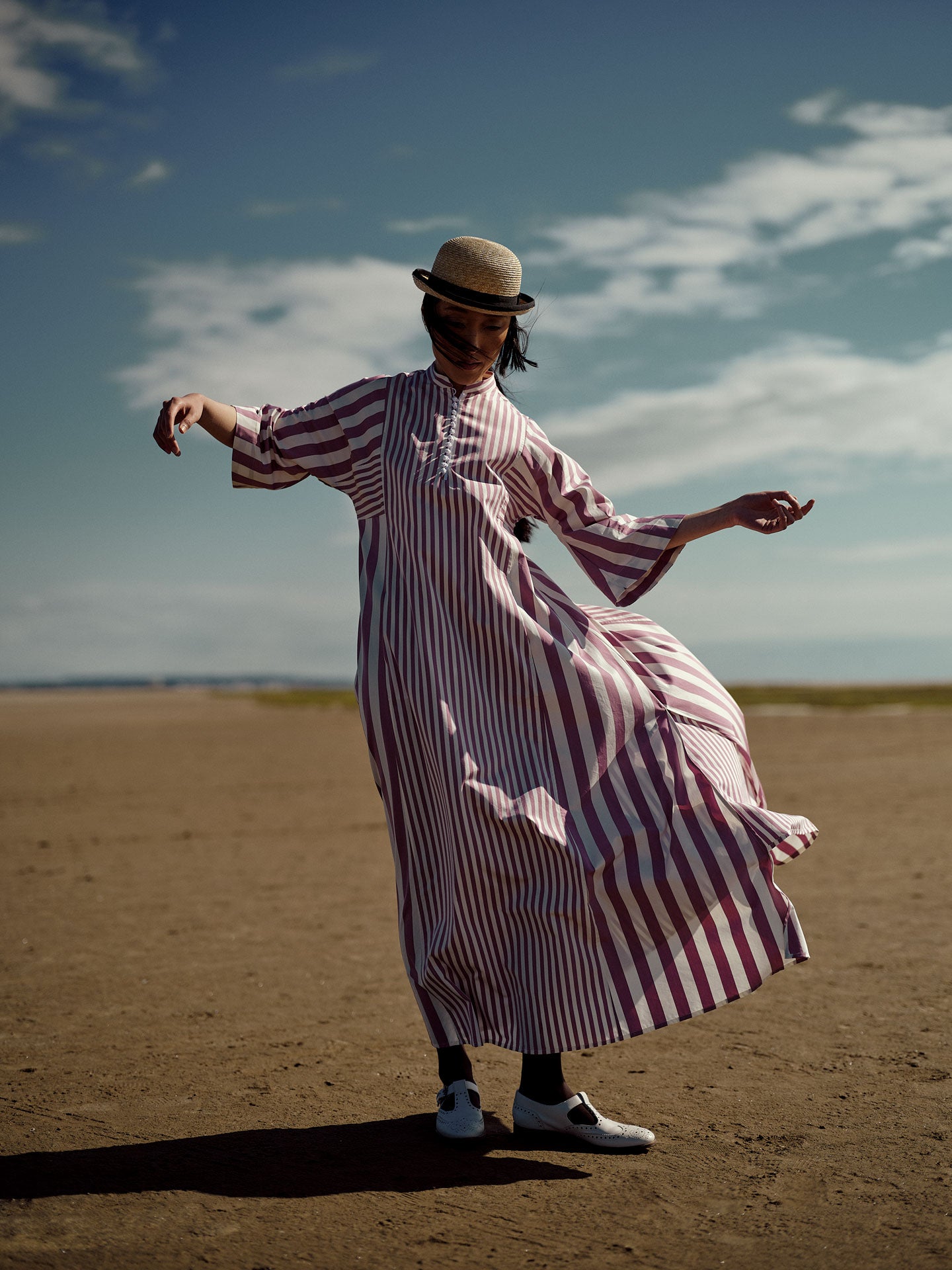 Rachel Long Kaftan in Cyclamen with bold stripe patterns by Thierry Colson