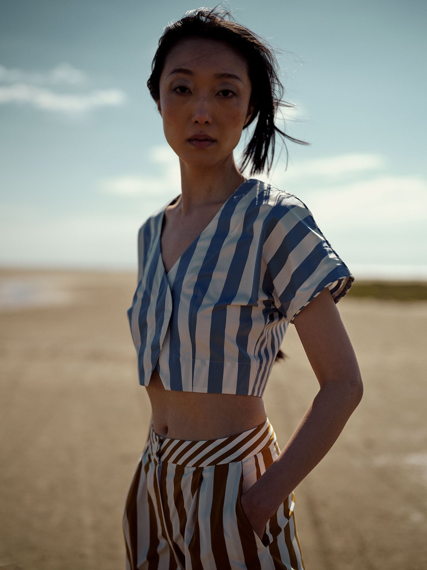 Other view - Model wearing Bianca Vest with Loulou trousers in Tobacco stripes.