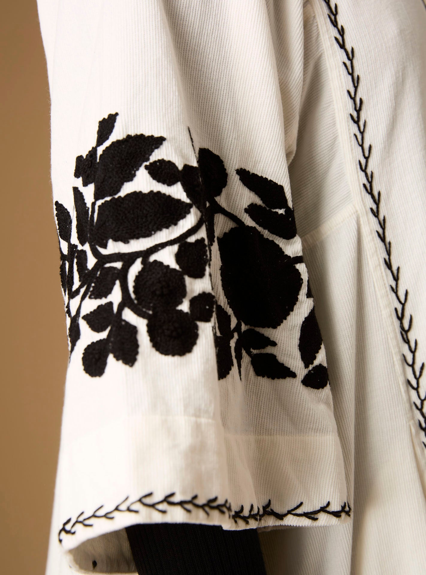 Detail view of Sleeve Rachel Cream/Black Midi Dress by Thierry Colson
