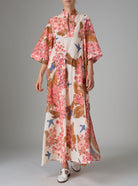 Front view of Rachel Long Kaftan with pagoda sleeves in light cotton voile, featuring pink and off-white Garden of Eden print. PS25 by Thierry Colson